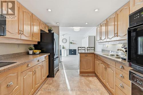 Kitchen - 1808 - 2170 Marine Drive, Oakville, ON - Indoor Photo Showing Kitchen With Double Sink