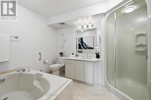 Primary Ensuite Soaker Tub & His/Hers vanities - 1808 - 2170 Marine Drive, Oakville, ON - Indoor Photo Showing Bathroom