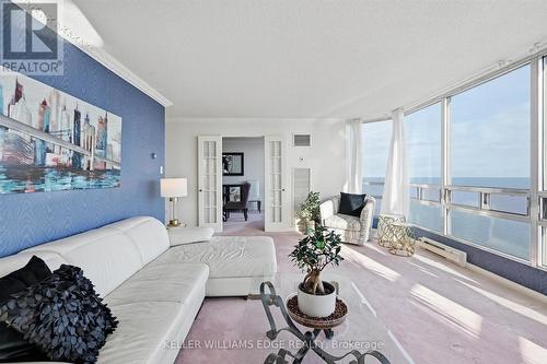 Living Room with Lake view - 1808 - 2170 Marine Drive, Oakville, ON - Indoor Photo Showing Living Room