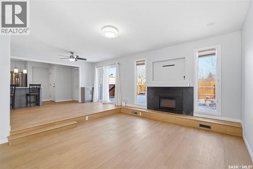 19 Barr Place, Saskatoon, SK - Indoor Photo Showing Living Room With Fireplace