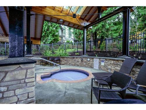 100 6299 144 Street, Surrey, BC - Outdoor With In Ground Pool With Deck Patio Veranda