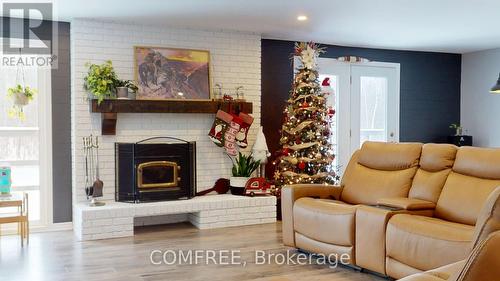 1500 Du Golf Road, Clarence-Rockland, ON - Indoor Photo Showing Living Room With Fireplace