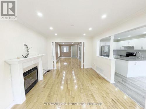 Family Room - 3310 Crimson King Circle, Mississauga, ON - Indoor Photo Showing Kitchen With Fireplace