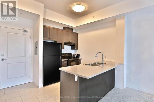 417 - 5020 Corporate Drive, Burlington, ON - Indoor Photo Showing Kitchen With Double Sink