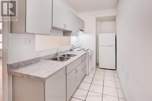 102 - 1530 King Street W, Toronto, ON - Indoor Photo Showing Kitchen With Double Sink