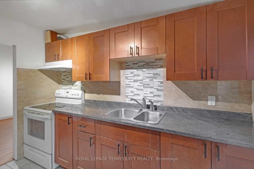 201-2977 Lawrence Avenue E, Toronto, ON - Indoor Photo Showing Kitchen With Double Sink