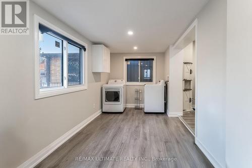Laundry room/sunroom with walkout - 47 Mahoney Avenue, Toronto, ON - Indoor Photo Showing Laundry Room