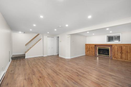 Salle familiale - 4740 Rue Anthime, Montréal (Pierrefonds-Roxboro), QC - Indoor With Fireplace