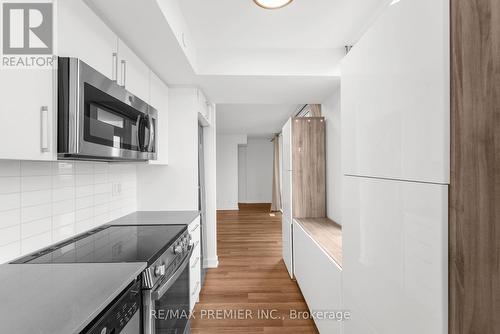 102 - 38 Monte Kwinter Court, Toronto, ON - Indoor Photo Showing Kitchen