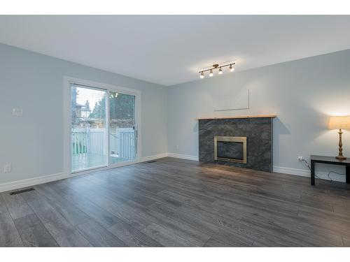 10037 158A Street, Surrey, BC - Indoor Photo Showing Living Room With Fireplace