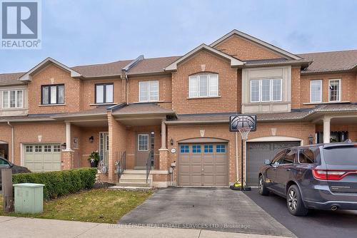 Surrounded By Every Convenience You Could Need! - 1765 Cobra Crescent, Burlington, ON - Outdoor With Facade