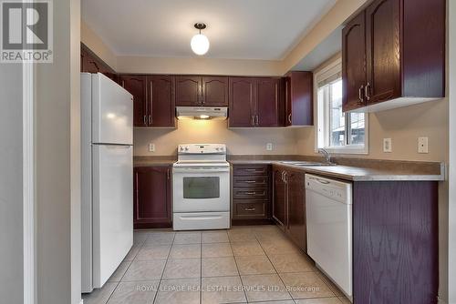 Spacious Kitchen with Abundant Cabinetry - 1765 Cobra Crescent, Burlington, ON - Indoor Photo Showing Kitchen