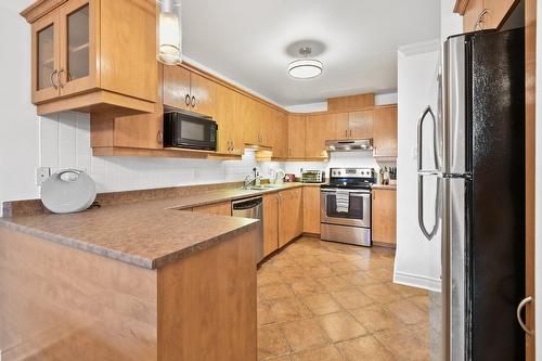 Cuisine - 101-6535 Boul. Chevrier, Brossard, QC - Indoor Photo Showing Kitchen With Double Sink