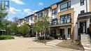 H212 - 90 Canon Jackson Drive, Toronto, ON  - Outdoor With Facade 