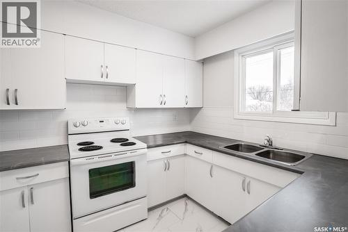 1409 Preston Avenue S, Saskatoon, SK - Indoor Photo Showing Kitchen With Double Sink