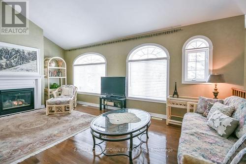 25 Cunningham Drive, Essa, ON - Indoor Photo Showing Living Room With Fireplace