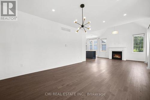 3205 Mosley Street, Wasaga Beach, ON - Indoor Photo Showing Other Room With Fireplace