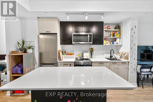 813 - 2300 St Clair Avenue W, Toronto, ON - Indoor Photo Showing Kitchen With Upgraded Kitchen