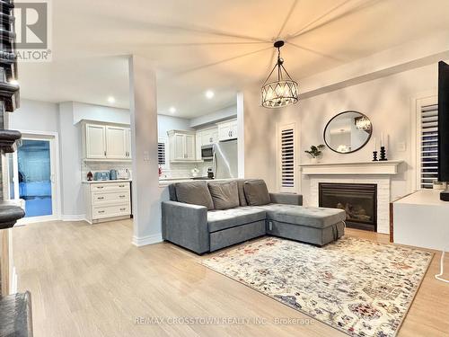 1 Black Ash Trail, Barrie, ON - Indoor Photo Showing Living Room With Fireplace