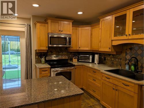 Main Level - 3576 Rose Road, Kelowna, BC - Indoor Photo Showing Kitchen With Double Sink