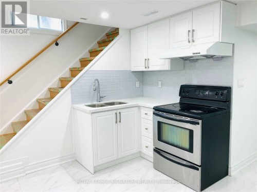 Lower-23 Lynmont Road, Toronto, ON - Indoor Photo Showing Kitchen With Double Sink