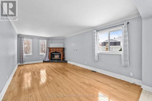 976 Laporte Street, Clarence-Rockland, ON - Indoor Photo Showing Living Room With Fireplace