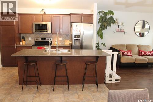 3330 Green Moss Lane, Regina, SK - Indoor Photo Showing Kitchen With Double Sink
