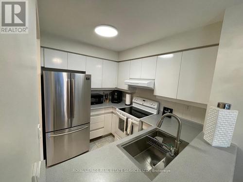 209 - 942 Yonge Street, Toronto, ON - Indoor Photo Showing Kitchen With Double Sink