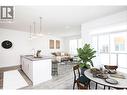 Virtual Staging - Living Room/ Kitchen - 610 Academy Way Unit# 118, Kelowna, BC  - Indoor 