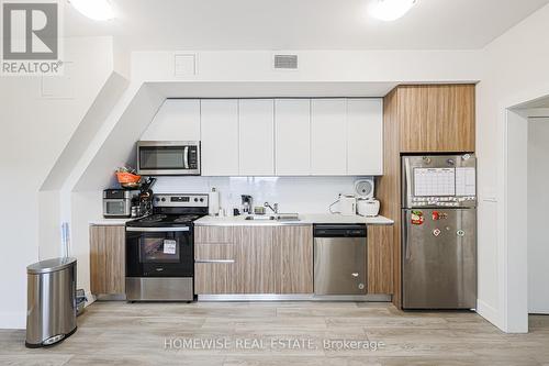 R02 - 293 Viewmount Avenue, Toronto, ON - Indoor Photo Showing Kitchen With Double Sink