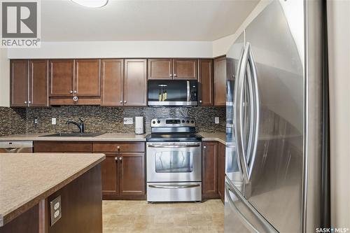 103 2351 Windsor Park Road, Regina, SK - Indoor Photo Showing Kitchen With Stainless Steel Kitchen