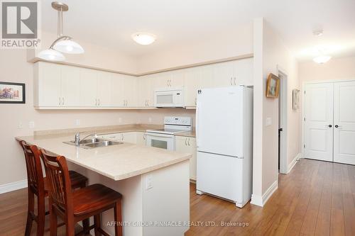 103 - 94 Francis Street W, Kawartha Lakes (Fenelon Falls), ON - Indoor Photo Showing Kitchen With Double Sink