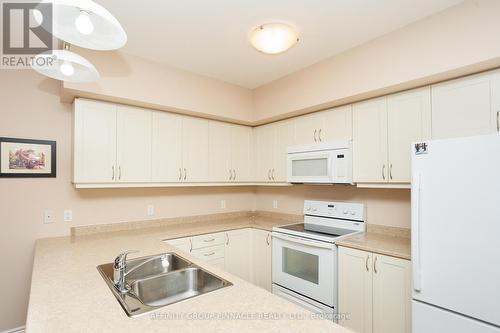 103 - 94 Francis Street W, Kawartha Lakes (Fenelon Falls), ON - Indoor Photo Showing Kitchen With Double Sink
