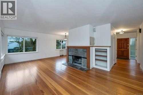 1181 Clovelly Terr, Saanich, BC - Indoor Photo Showing Living Room With Fireplace