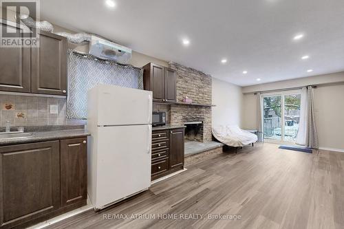 3 Plumbrook Crescent, Toronto, ON - Indoor Photo Showing Kitchen With Fireplace