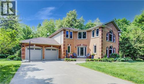 summer photo - 7664 Maltby Road E, Puslinch, ON - Outdoor With Facade
