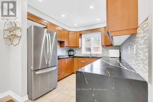 4693 Thomas Alton Boulevard, Burlington, ON - Indoor Photo Showing Kitchen With Double Sink