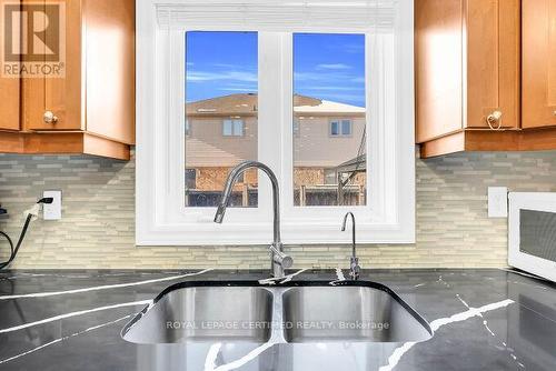 4693 Thomas Alton Boulevard, Burlington, ON - Indoor Photo Showing Kitchen With Double Sink