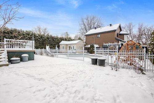 Backyard - 2915 Rue Bellerive, Sainte-Marthe-Sur-Le-Lac, QC - Outdoor With Deck Patio Veranda