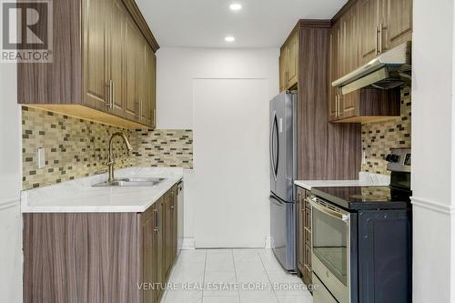 416 Hansen Road N, Brampton, ON - Indoor Photo Showing Kitchen With Double Sink