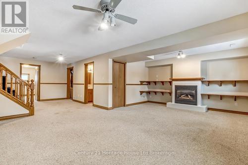 218 Diefenbaker Drive, Woodstock (Woodstock - North), ON - Indoor With Fireplace