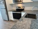 212 - 1010 Dundas Street E, Whitby, ON  - Indoor Photo Showing Kitchen With Double Sink With Upgraded Kitchen 