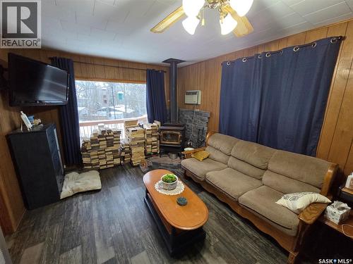 697 8Th Street, White Bear Ir 70, SK - Indoor Photo Showing Living Room With Fireplace