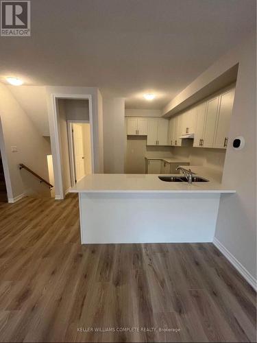 148 - 677 Park Road N, Brantford, ON - Indoor Photo Showing Kitchen With Double Sink
