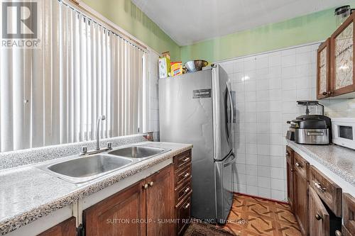 58 - 2901 Jane Street, Toronto, ON - Indoor Photo Showing Kitchen With Double Sink