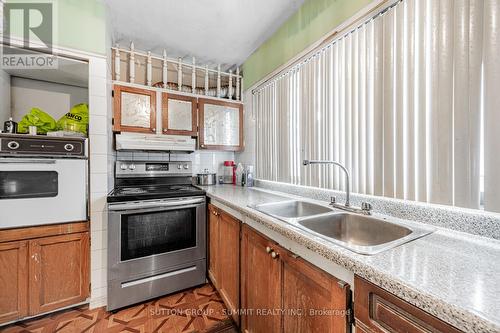 58 - 2901 Jane Street, Toronto, ON - Indoor Photo Showing Kitchen With Double Sink
