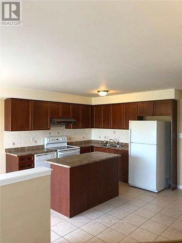 139 Raponi Circle, Toronto, ON - Indoor Photo Showing Kitchen With Double Sink