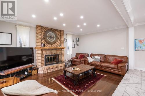 62 Stargell Drive, Whitby, ON - Indoor Photo Showing Living Room With Fireplace