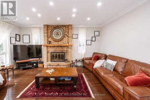 62 Stargell Drive, Whitby, ON - Indoor Photo Showing Living Room With Fireplace