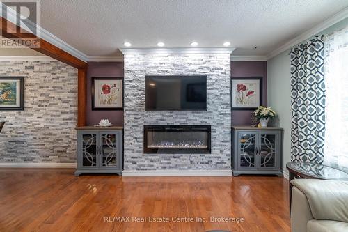 7730 Sixth Line, Centre Wellington, ON - Indoor Photo Showing Living Room With Fireplace